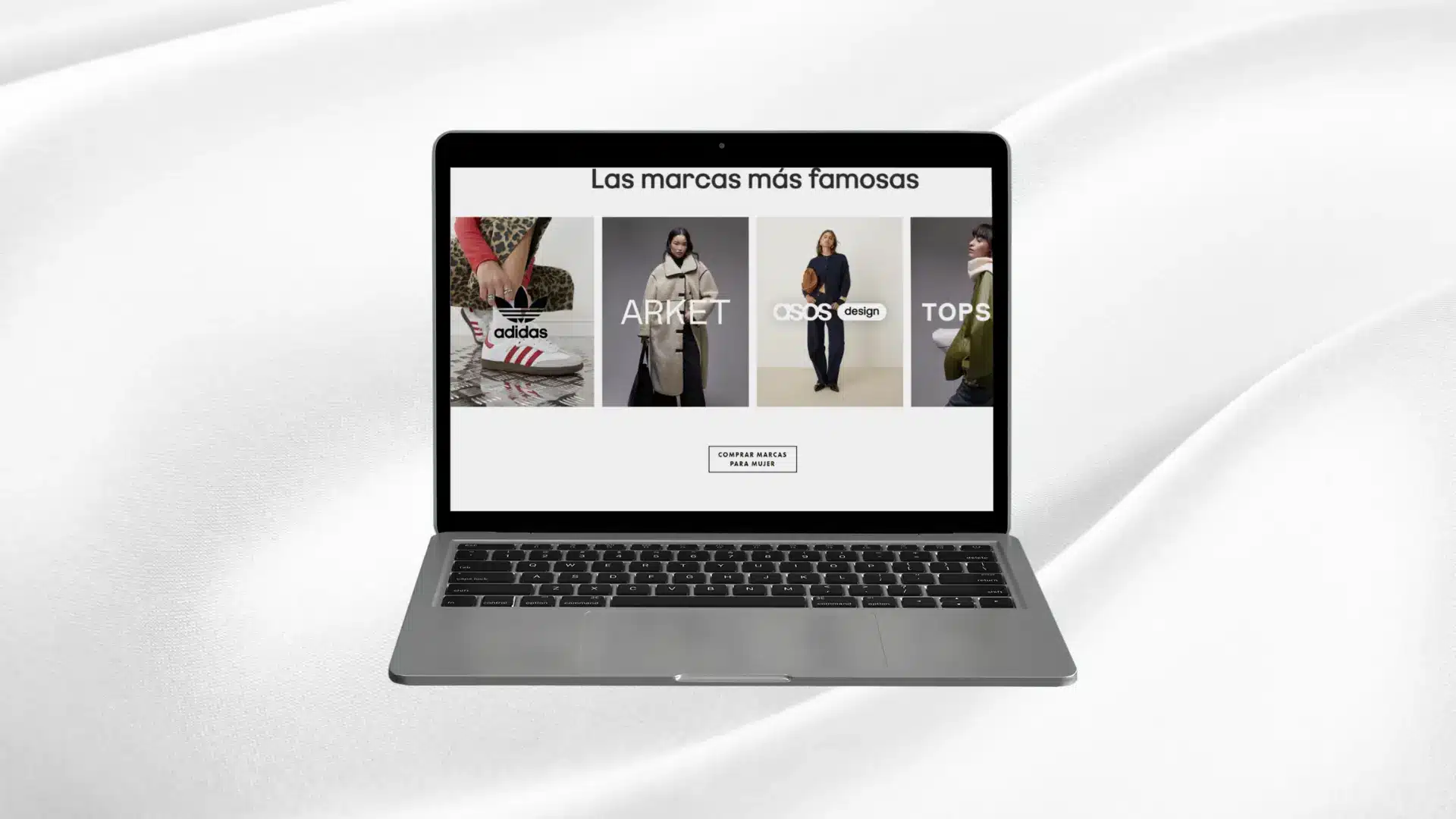Vista de tienda en línea de marcas de moda en laptop - tumarcaviral.com, agencia de marketing digital